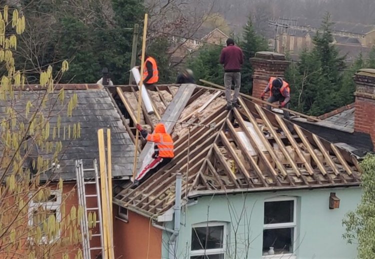 Roofers caught using phone lights to work at night